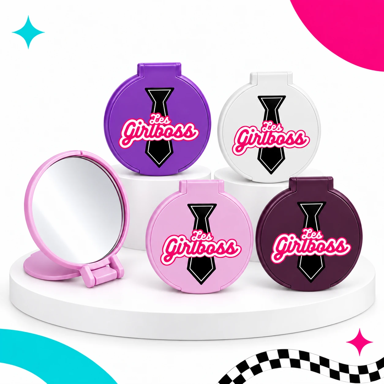 Petits miroirs pliants Girlboss en violet, blanc, rose et prune, avec un miroir rose ouvert